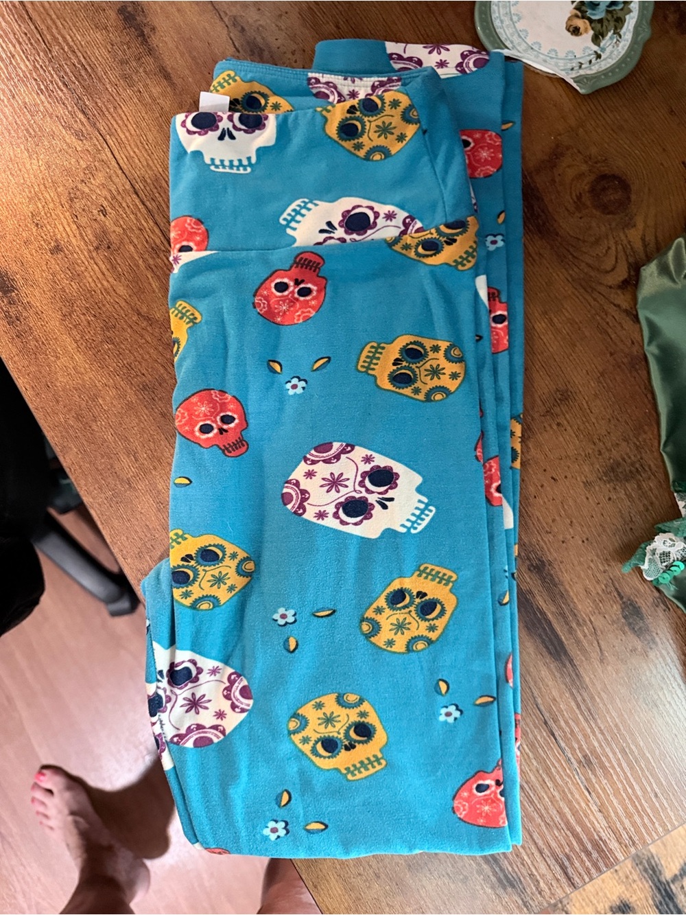 LuLaRoe Teal Sugar Skull Leggings